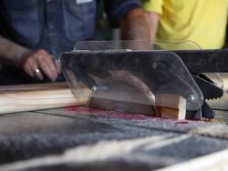 Carpenters hard at work cutting wood Stock Footage