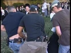 Scuffles as ultra-orthodox Jews protest Sabbath opening of car park News Clip
