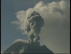 CU grey smoke and ash cloud rising quickly upwards from crater, zoom out to WA, Mount Tunguragua, Ecuador Stock Footage