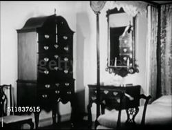 1957: EARLY AMERICAN FURNITURE: WS Antique furniture grouping in bedroom, Highboy dresser, Lowboy under mirror. MS Lowboy side table. MS Sideboard. Americana, style, historical period, antiques. Instructional Video