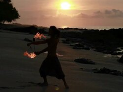 MS Silhuoette of rasta man spinning fire on beach with sunrise / Montezuma, Punteranes, Costa Rica Stock Footage