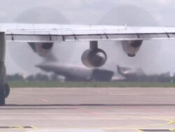 Plane with MH17 Victims' Bodies Depart Kharkiv News Clip