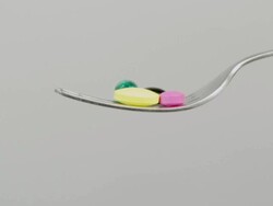 Pills on a fork Stock Footage
