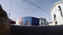 Young adult male rollerblade in urban street Stock Footage