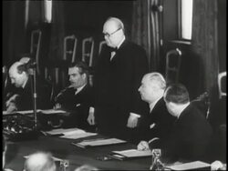 Prime Minister Winston Churchill speaks at a meeting of officials. News Clip