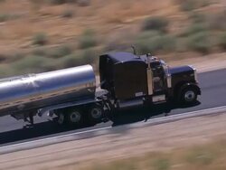 Aerial TS CU LA fuel tanker on road / Mojave Desert, California, United States. Stock Footage