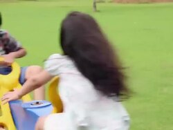 Boy and girl swinging in a Seesaw Stock Footage