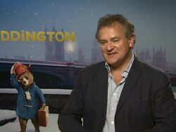 INTERVIEW - Hugh Bonneville on growing up with 'Paddington', being nervous about being apart of such an iconic character at 'Paddington' Interviews Stock Footage