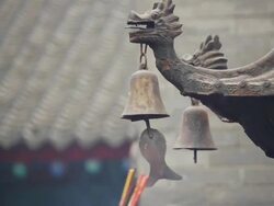 MS Pilgrims raising joss sticks to touch tintinnabulum of cense burner pray for good luck during Chinese Lunar New Year at Taoist temple / xi'an, shaanxi, china Stock Footage