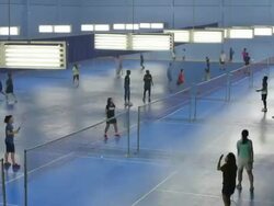 Footage of badminton courts with lots of players Stock Footage