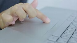 Businesswoman touch on touchpad laptop Stock Footage