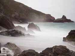WS T/L Waves washing ashore along rocky coast / Big Sur, California, United States Stock Footage
