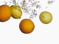 HD Super Slow-Mo: Citrus Fruits Splashing Into Water Stock Footage