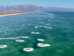 WS AERIAL View of dead sea salt formationsa / Ein boqeq, Sourn Judea Desert, Israel    Stock Footage