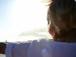 Woman spinning on beach Stock Footage
