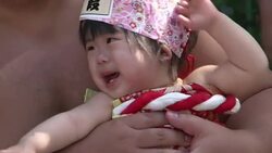 CLEAN : Having a bawl: Japans sumo wrestlers grapple with cry babies News Clip