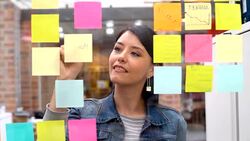 Woman brainstorming at a creative office Stock Footage