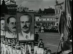 Joseph Stalin, Nikita Khrushchev, and other Russian officials watch a parade. News Clip