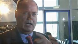 Parliament backs enhanced eurozone rescue package, reax News Clip