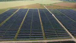 Texas Hill Country FarmLands with Solar Power Plant outside of Austin TX Solar Panel Array Stock Footage