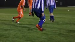 Soccer player dribbling ball - Two shots Stock Footage