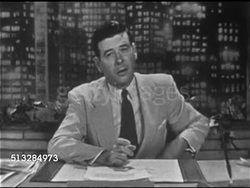 1952: PROGRAM EXPOSITION: Anchor Frank Blair sitting behind desk w/ cityscape BG, SOT saying photo just arrive, presenting for what it's worth, there have been unexplained in sky. Dr. Walter Regal joining Frank at desk, Frank saying let's check Washin Instructional Video