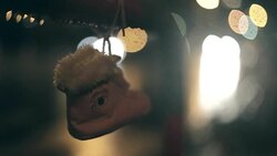 Hanging shoe, Defocused passing car, Night, Light Reflection Stock Footage