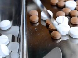 Counting tablets medicine Stock Footage