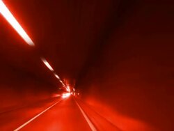 HD Driving through Road Tunnel (Red Toned) Stock Footage