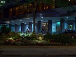 WS  PAN TU People coming  in and out from entrance of The Rittenhouse hotel building / Philadelphia, Pennsylvania,United States Stock Footage