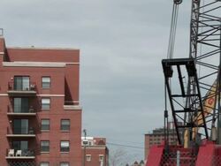 WS PAN View of hydraulic shear demolition building / Chicago, Illinois, USA Stock Footage