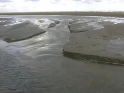 Low tide at beach, water running off, North Sea (HD) Stock Footage