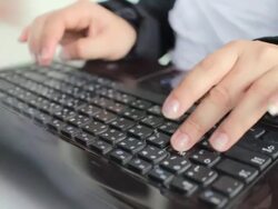 Businesswoman Typing On Laptop Keyboard,Dolly shot Stock Footage