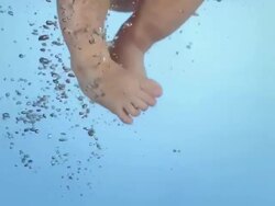 HD: Baby Feet Kicking In Bathtub Stock Footage