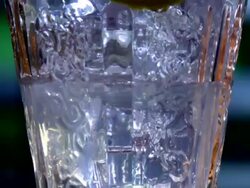 ROTATING GLASS FILLED WITH LEMONADE-1080HD Stock Footage