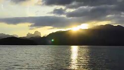 limestone in Cheow Lan lake at sunset, Thailand in winter season Stock Footage