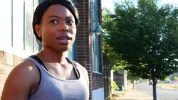 MS Laughing woman in discussion with friends after morning run Stock Footage