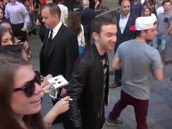 Cal Shapiro & producer Rob Resnick(Timeflies ) hug, sign for & pose with fans while walking back into the Good Morning America show in Times Square Stock Footage