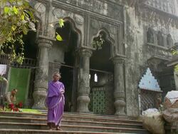 MS Ghats with woman in purple sari in Zenana baths / Calcutta, West, Bengal India Stock Footage