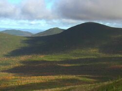 WS AERIAL ZI ZO PAN View of clouds over Baxter State Park / Maine, United States Stock Footage