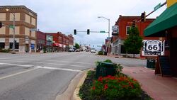 Sapulpa Oklahoma Route 66 town main street called Dewey Street with Route 66 signage get your kicks on Route 66 Stock Footage