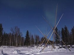 Night scenery of aurora polaris and teepees Stock Footage