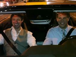 MS POV Two young man driving in modern converrtible car laughing and smiling at night in urban area / Minneapolis, Minnesota, United States Stock Footage