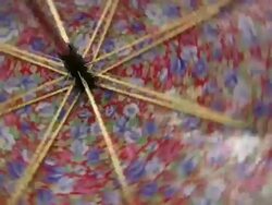 HD 1080i Spinning Umbrella 1 Stock Footage
