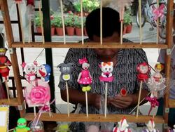 MS Artist making dough sculpture in street market / Tianjin, China Stock Footage