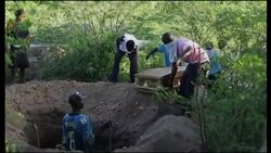 Two cholera victims buried in outbreak that has left 250 people dead News Clip