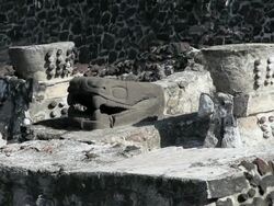 MS Stone carved head of snake of god named Quetzalcoatl / Mexico City, Mexico, Mexico Stock Footage