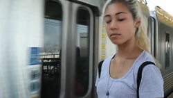 Teenager waiting for train anxiously Stock Footage