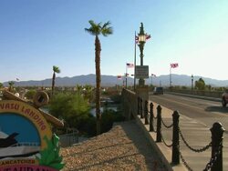WS, Traffic on London Bridge crossing Lake Havasu, Lake Havasu City, Arizona, USA Stock Footage
