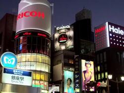 Lit Buildings at Ginza at Night with Ginza Line Subway Entrance, Tokyo, Japan Stock Footage